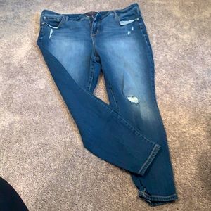 Distress skinny jeans.